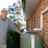 Man with water tank